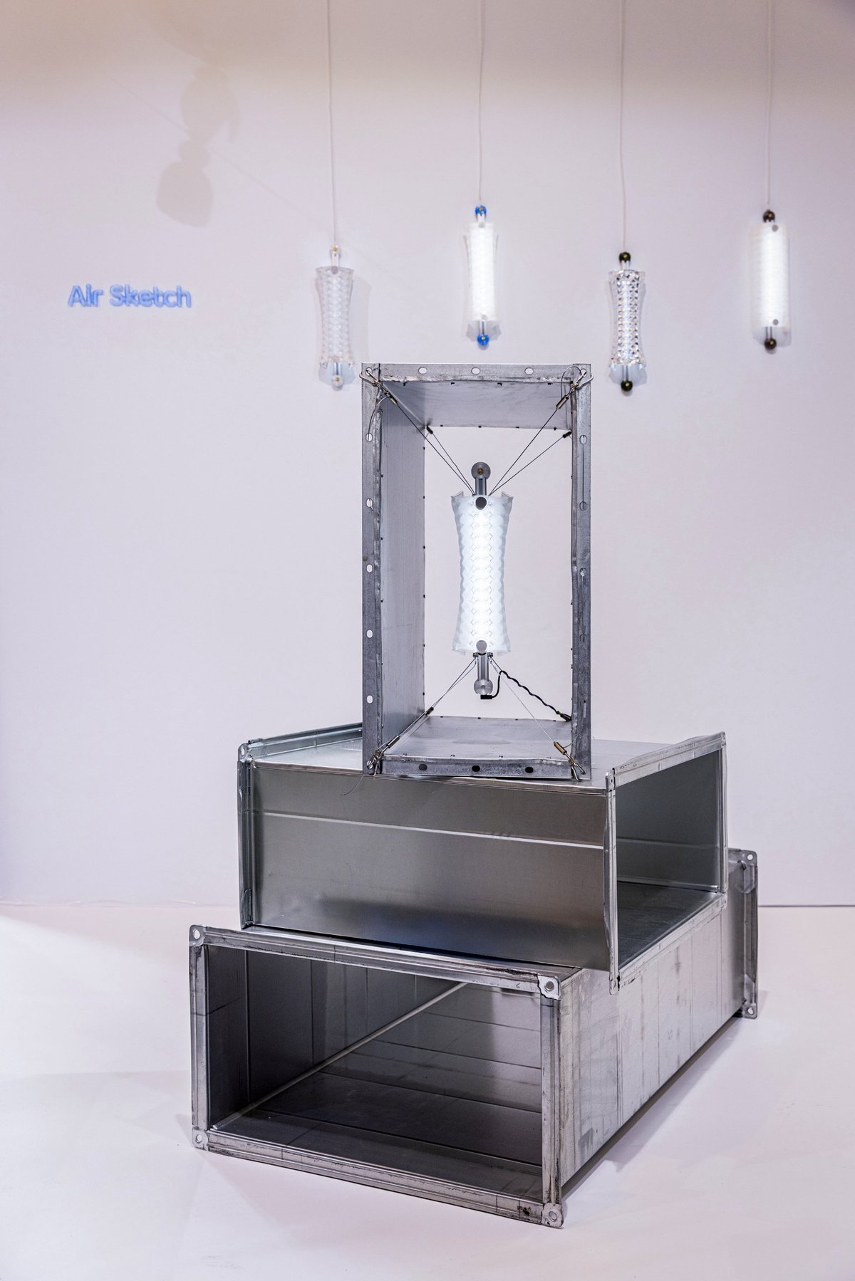 Air Forming Lamps exhibited with Air Sketch on galvanised ducts